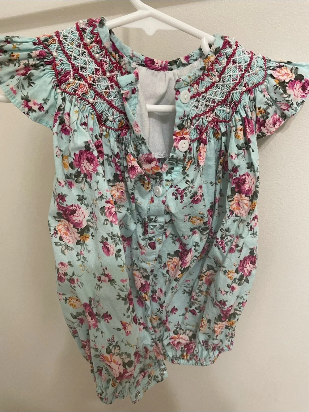 Floral Smocked Off-Shoulder Baby Top in Light Blue and Pink
